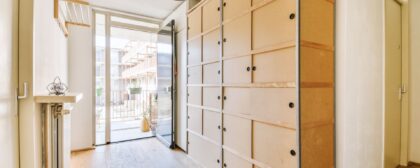 Hallway in home with plenty of cupboard space.